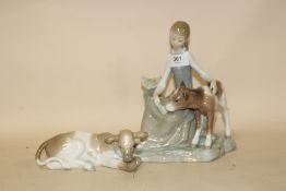 A LLADRO FIGURE OF A SEATED GIRL WITH A CALF TOGETHER WITH A LLADRO SEATED CALF FIGURE