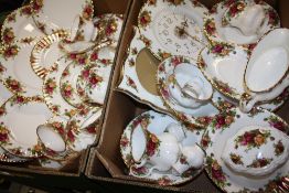 FOUR TRAYS OF ROYAL ALBERT OLD COUNTRY ROSES CHINA TO INCLUDE CUPS AND SAUCERS, CLOCK, PICTURE