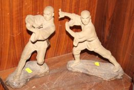 A PAIR OF ORIENTAL MATT FINISH CERAMIC FIGURES