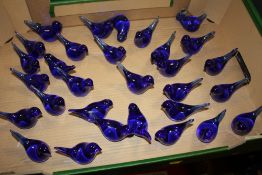 A TRAY OF BLUE GLASS BIRD SHAPED PAPERWEIGHTS (30 APPROX)