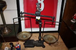 A SET OF CAST METAL SCALES