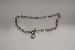 A STERLING SILVER NECKLACE WITH HEART SHAPED PENDANT APPROX WEIGHT - 36.6G