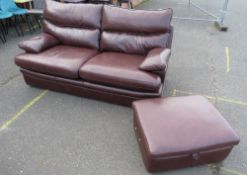 A MODERN G-PLAN BROWN LEATHER TWO SEATER SETTEE WITH FOOTSTOOL
