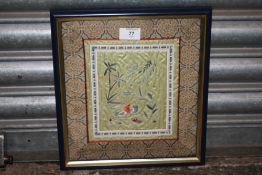 A FRAMED AND GLAZED EMBROIDERY ON SILK OF BIRDS - OVERALL SIZE INCLUDING FRAME 29CM X 32CM