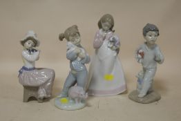 FOUR NAO FIGURES OF CHILDREN WITH DOGS