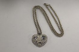 A STERLING SILVER HEART PENDANT ON CHAIN APPROX WEIGHT - 43.3G