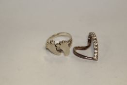 A STERLING SILVER HEART SHAPED PENDANT, TOGETHER WITH A SILVER RING APPROX WEIGHT - 7.9G