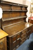 A DARK OAK ERCOL STYLE DRESSER W-144CM