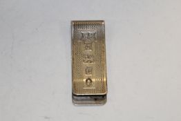 A HALLMARKED SILVER MONEY CLIP