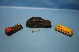 A 1950S CHAD VALLEY WIND UP WONDER CAR with key together with a vintage tin plate coach and train