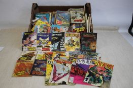 COMMANDO COMICS (over 100) to include five early numbers #48, #162, #299, #411, #557 (A/F) the