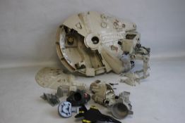 AN UNBOXED KENNER 1979 MILLENIUM FALCON, together with an unboxed scout walker