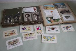 AN EDWARDIAN POSTCARD ALBUM AND CONTENTS to include a good selection of portrait beauties, along