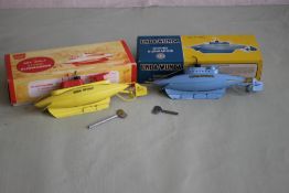 TWO BOXED SUTCLIFFE TINPLATE CLOCKWORK SUBMARINES to include 'Unda-Wunda Diving Submarine' with