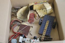 A QUANTITY OF MECCANO PIECES WHICH FORM PART OF A 1930S TINPLATE RACING CAR A/F together with an