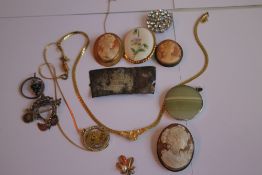 A YELLOW METAL CAMEO BROOCH and a quantity of assorted costume jewellery
