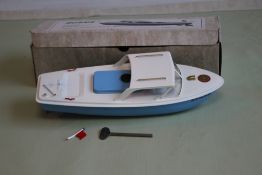 A SUTCLIFFE TINPLATE CLOCKWORK CRUISER 'DIANA' in original box with key