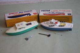 TWO SUTCLIFFE TINPLATE CLOCKWORK BOATS to include a 'Victor Motor Torpedo Boat' in blue and white