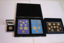A ROYAL MINT 2004 PROOF SET, a cased 2004 £2 and two proof sets 1972 and 1977 (the latter two in