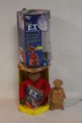 A BOXED E.T INTERACTIVE TOY, together with a similar example