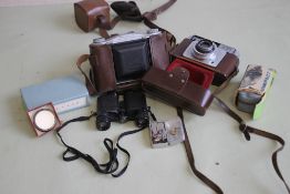 AN ENSIGN SELFIX 12-20 FOLDING CAMERA, along with Ilford Sportsman camera and various accessories