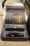 A VINTAGE CASH REGISTER with sliding scales A/F