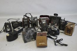 A TRAY OF ASSORTED VINTAGE CAMERAS to include a Polaroid 