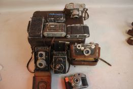 A SMALL CASE OF ASSORTED CAMERAS to include a Kodak 35, Argus, Koroll Film 120, Agfa Isolette