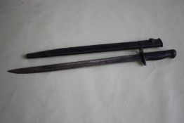 A 1907 WILKINSON BAYONET in scabbard