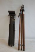 TWO VINTAGE WOODEN EXTENDING CAMERA TRIPODS