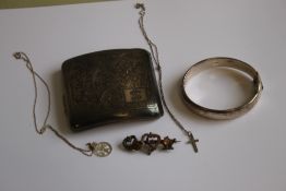A QUANTITY OF HALLMARKED SILVER, to include a cigarette case, bangle, brooch and two chains with