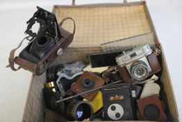 A SMALL CASE OF ASSORTED PHOTOGRAPHIC LENSES ETC. including a Halina Rolls Camera A/F