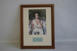 ELIZABETH TAYLOR - FRAMED AUTOGRAPH AND PHOTOGRAPH, image from 'Cat On A Hot Tin Roof' framed with