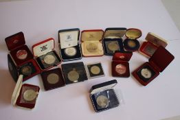 A COLLECTION OF BOXED VARIOUS PROOF AND UNC CROWN SIZED COINS, to include 1951 Festival of Britain