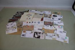 A COLLECTION OF STAMPS AND COINS, to include a selection of 