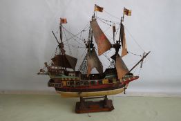 A PAINTED WOOD MODEL OF 