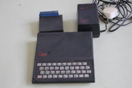A VINTAGE SINCLAIR ZX81 COMPUTER and ZX16K ram