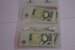 A COLLECTION OF BANK OF ENGLAND 10 SHILLINGS AND £1 NOTES