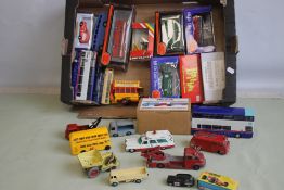 A QUANTITY OF DIECAST VEHICLES to include a boxed Britbus Guy Arab III Midland Red, an unboxed