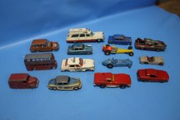 FOURTEEN VINTAGE DINKY VEHICLES to include 370 Fireball dragster, Triumph TR2, Corvette Stingray,
