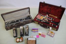 A SELMER CASED CLARINET in fitted case with extra reeds etc., together with another cased clarinet