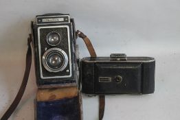 AN IKUFLEX TWIN LENS CAMERA AND AN AGFA CAMERA