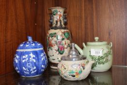 A COLLECTION OF ORIENTAL CERAMICS TO INCLUDE TEAPOTS, TWIN HANDLED VASE ETC.
