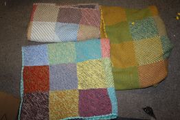A COLLECTION OF HAND STITCHED WOOLEN BLANKETS