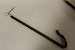 A HORN HANDLED VINTAGE LEATHER RIDING CROP