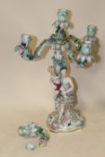 A PAIR OF MEISSEN STYLE FIGURAL FIVE BRANCH CANDELABRA, each column modelled as a seated lady