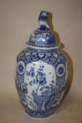 AN OCTAGONAL BLUE AND WHITE TEMPLE JAR AND COVER, decorated with birds and insects, H 43.5