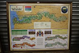 A LARGE FRAMED MACMILLAN WALL MAP OF THE GAMBIA - OVERALL SIZE INCLUDING FRAME 122CM X 95CM