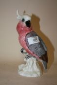 A BESWICK 1180 COCKATOO FIGURE