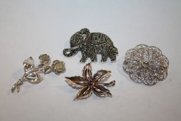 FOUR VINTAGE SILVER BROOCHES TO INCLUDE A MARCASITE SET ELEPHANT ETC - APPROX 30G